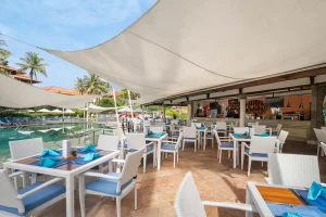 A restaurant interior featuring neatly arranged tables and chairs for dining.